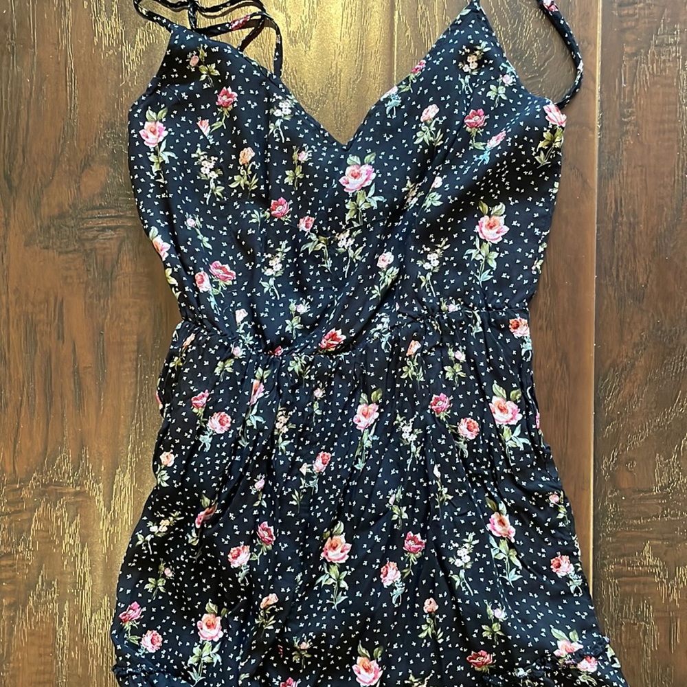 Black romper with pink flower details